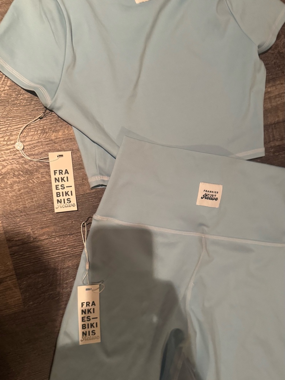 Frankie's Bikinis Active baby tee -T-Shirt — baby blue nwt